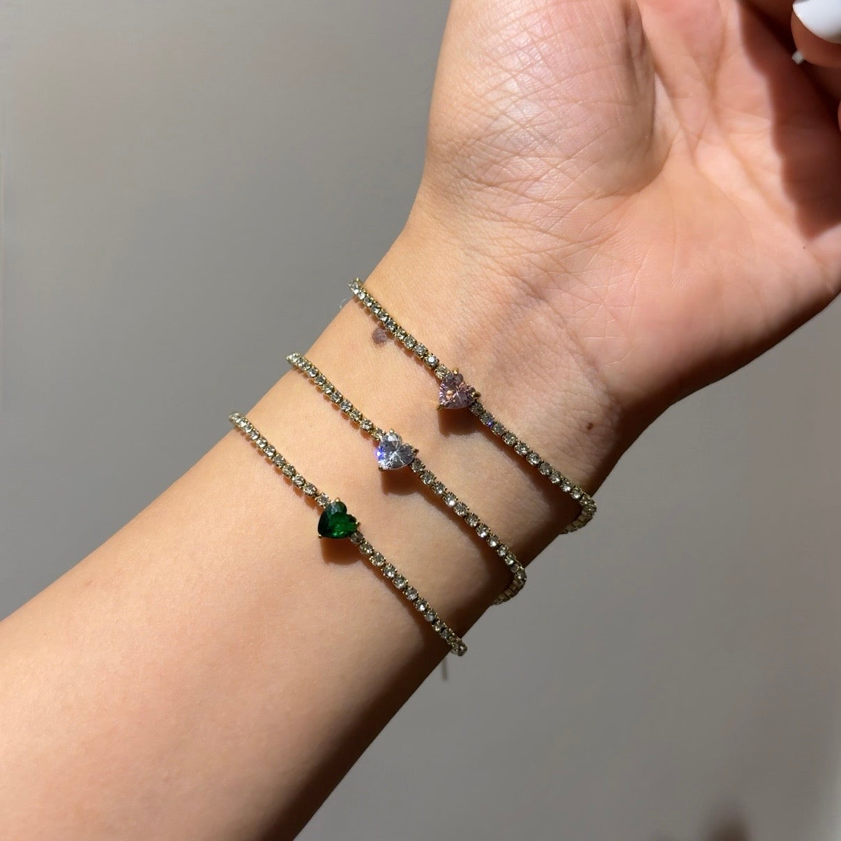 Emerald tennis heart bracelet