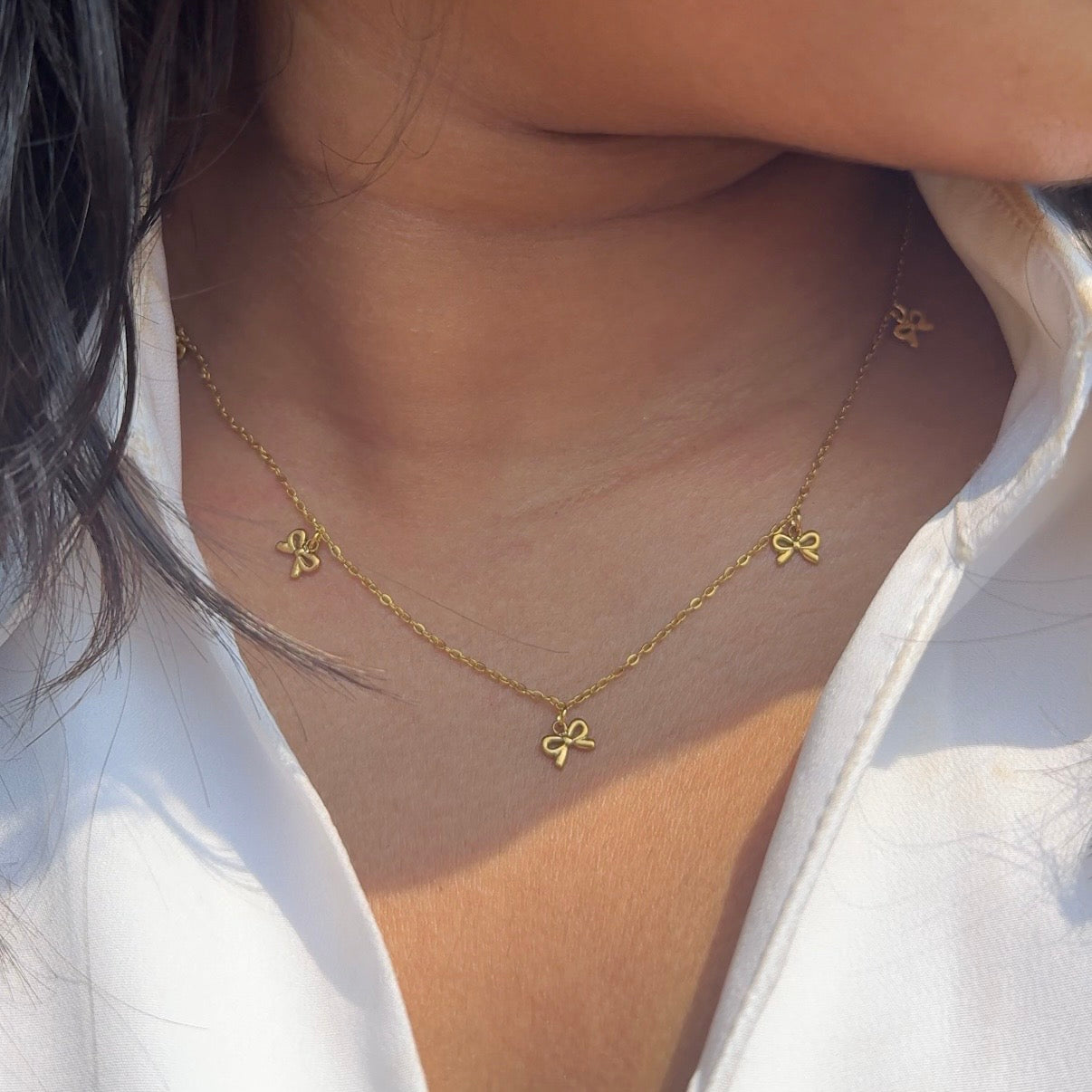 Hanging bow necklace