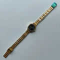 Golden charm watch